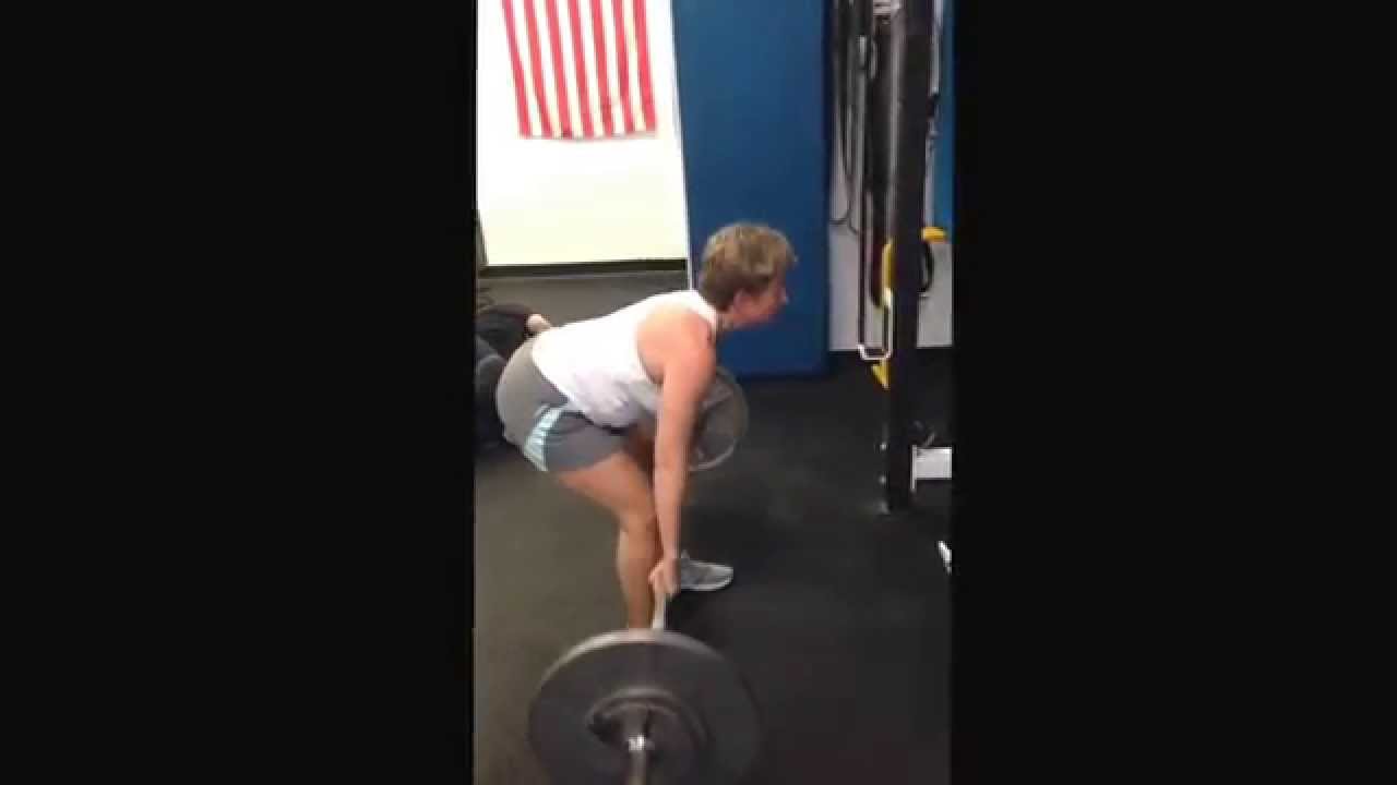 Baby boomer client Pat pulling some weight at Emerge!  Strong is the new skinny!