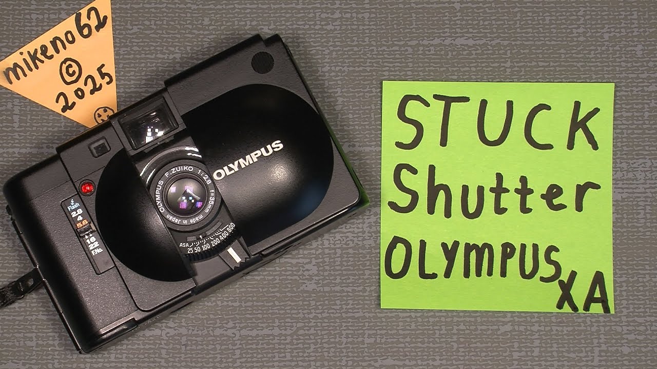 Olympus XA shutter is stuck open | Oil on the release magnet