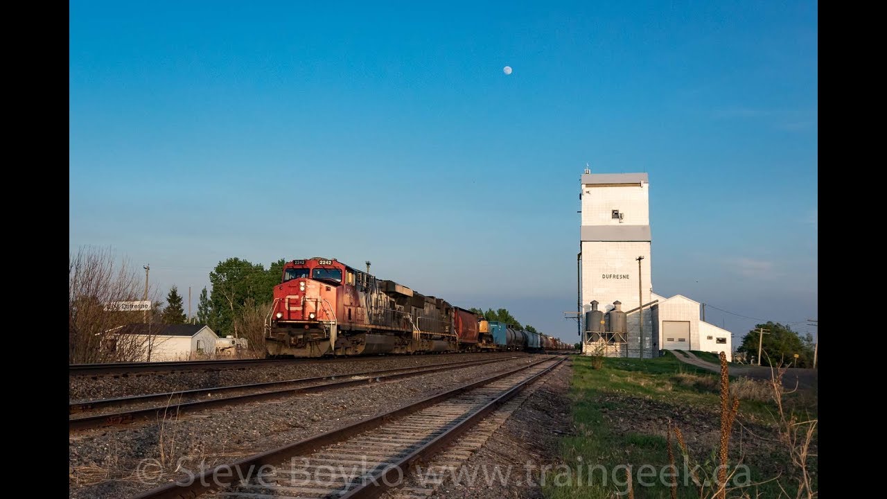 Trains and Grain Elevators - CN 2242 West at Dufresne