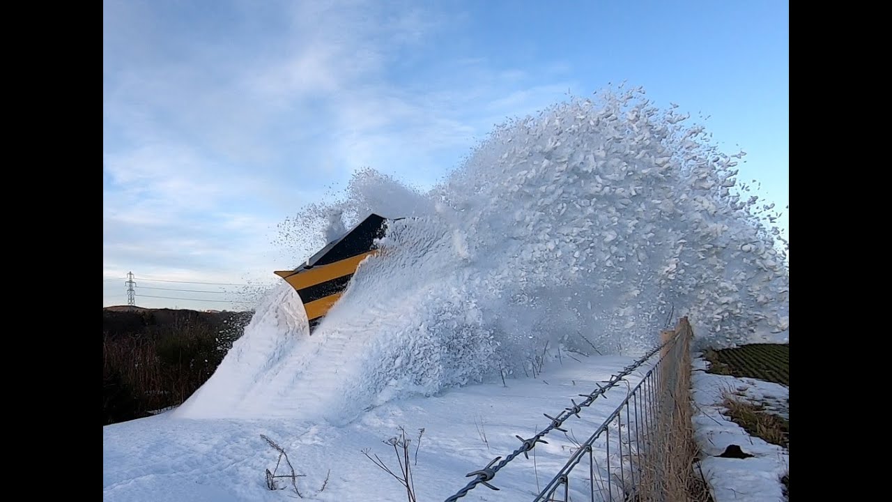 Class 37s clearing a snowdrift with independent snow ploughs at Huntly NE Scotland 16th Feb 2021