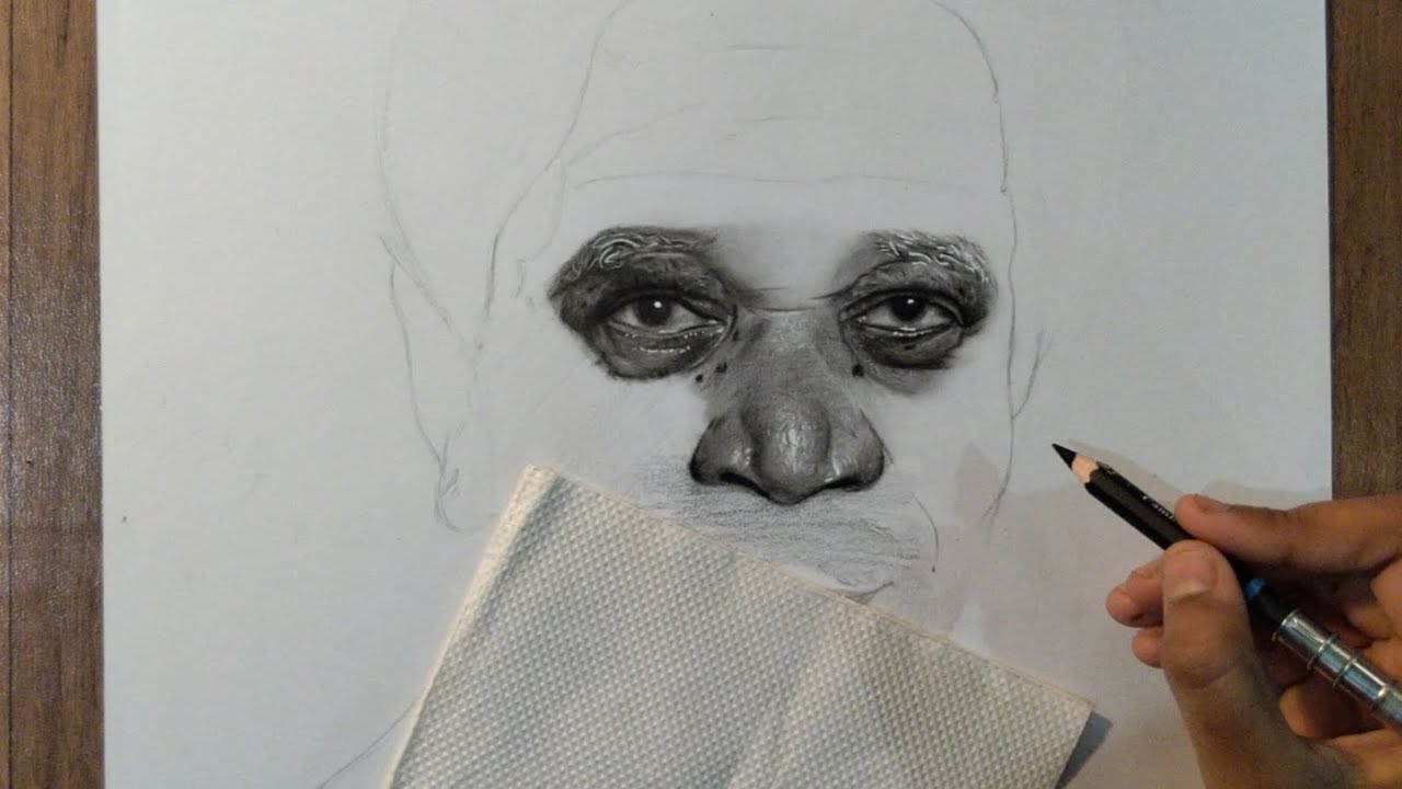 Shading eye and nose with charcoal pencils ||