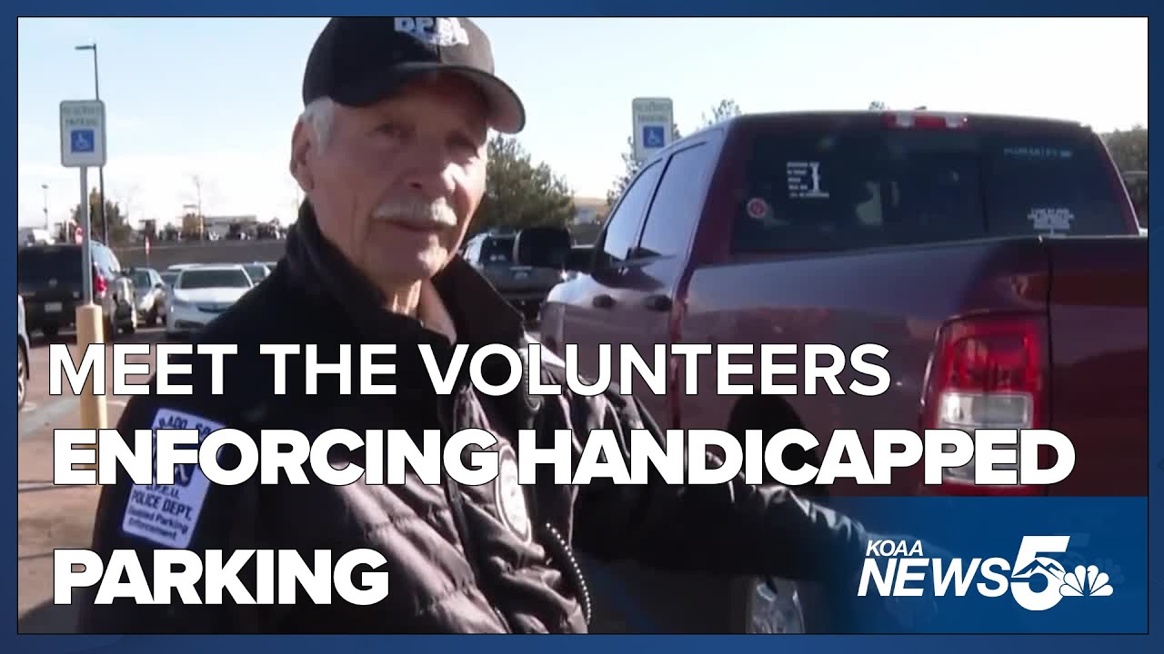 Volunteers keep unauthorized people from parking in handicapped spots