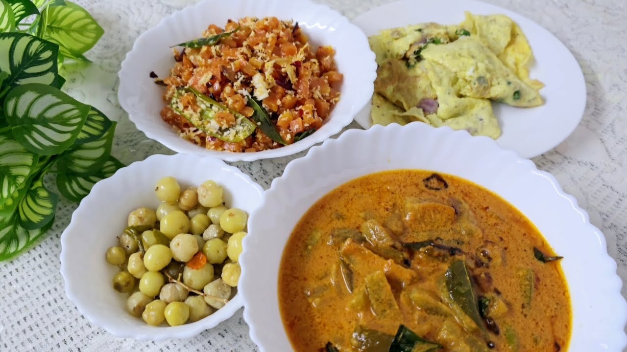 Today's lunch special features Padavalanga ilumbanpuli curry, carrot thoran, and an egg omelette.
