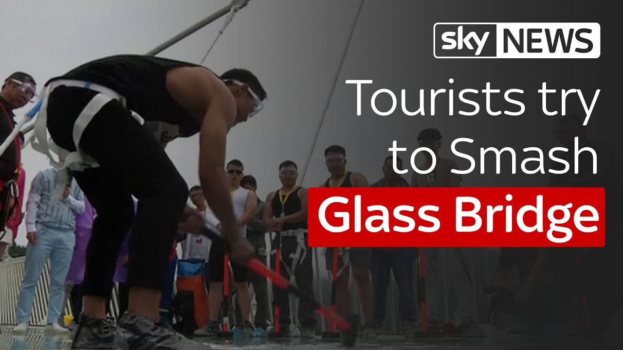 Tourists Try To Smash Glass Bridge
