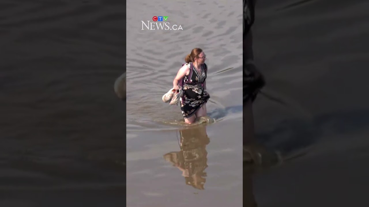 Braving flooded city streets