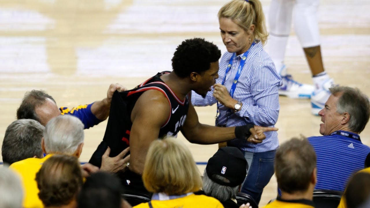Kyle Lowry get push by a Fan Reaction