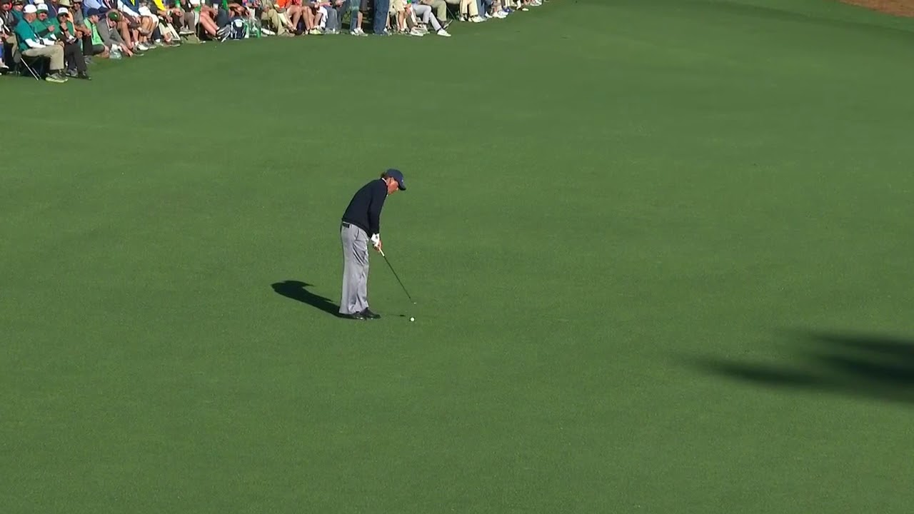 Phil Mickelson has caddie tend the pin from 60 yds out