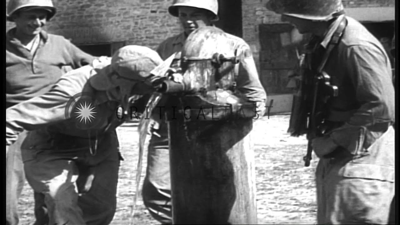 US 86th Regiment, 10th Mountain Division soldiers smoke in a village in Italy dur...HD Stock Footage