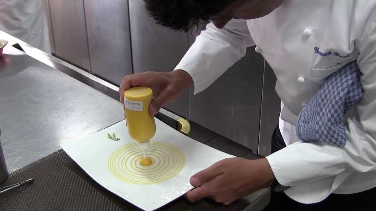 Franques prepares a lobster dish by using a disc jockey turntable