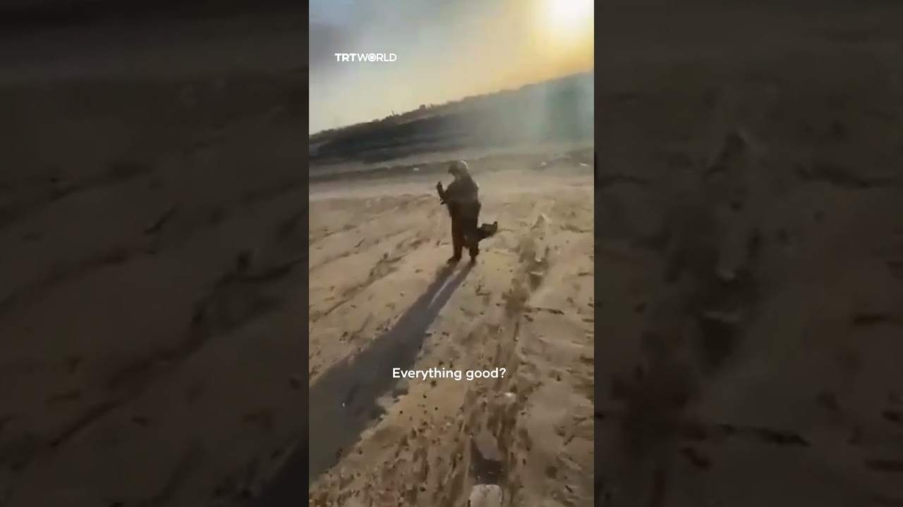 Kuwaiti civilians approach US F-15 pilot after he ejects