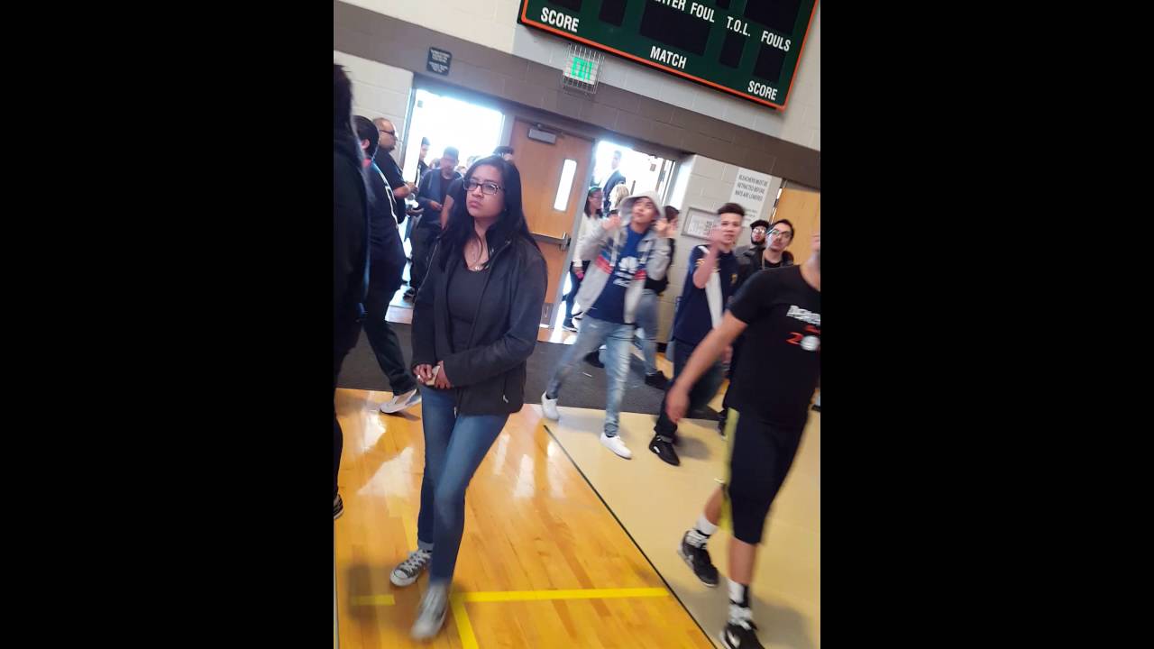 Adams City High School.  Saying goodbye to her seniors changing of the seats