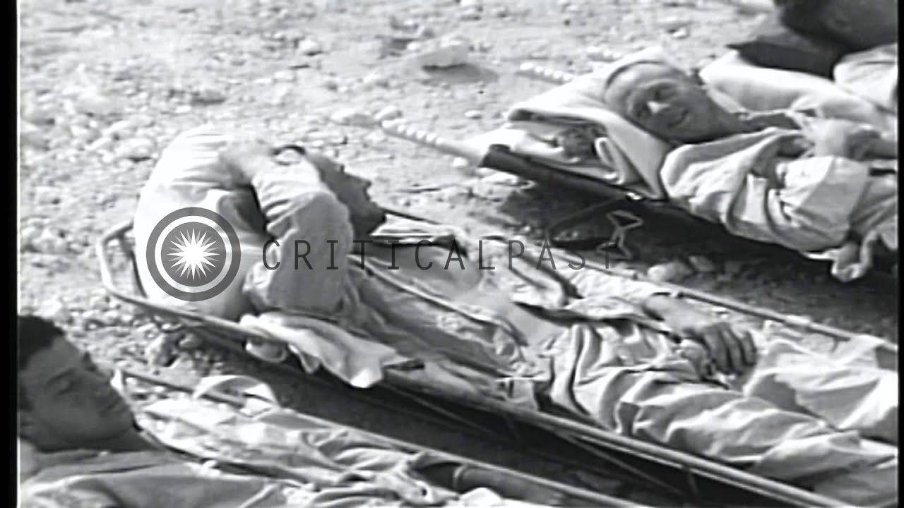 Survivors of USS Indianapolis (CA-35) are removed from ambulances and placed on a...HD Stock Footage