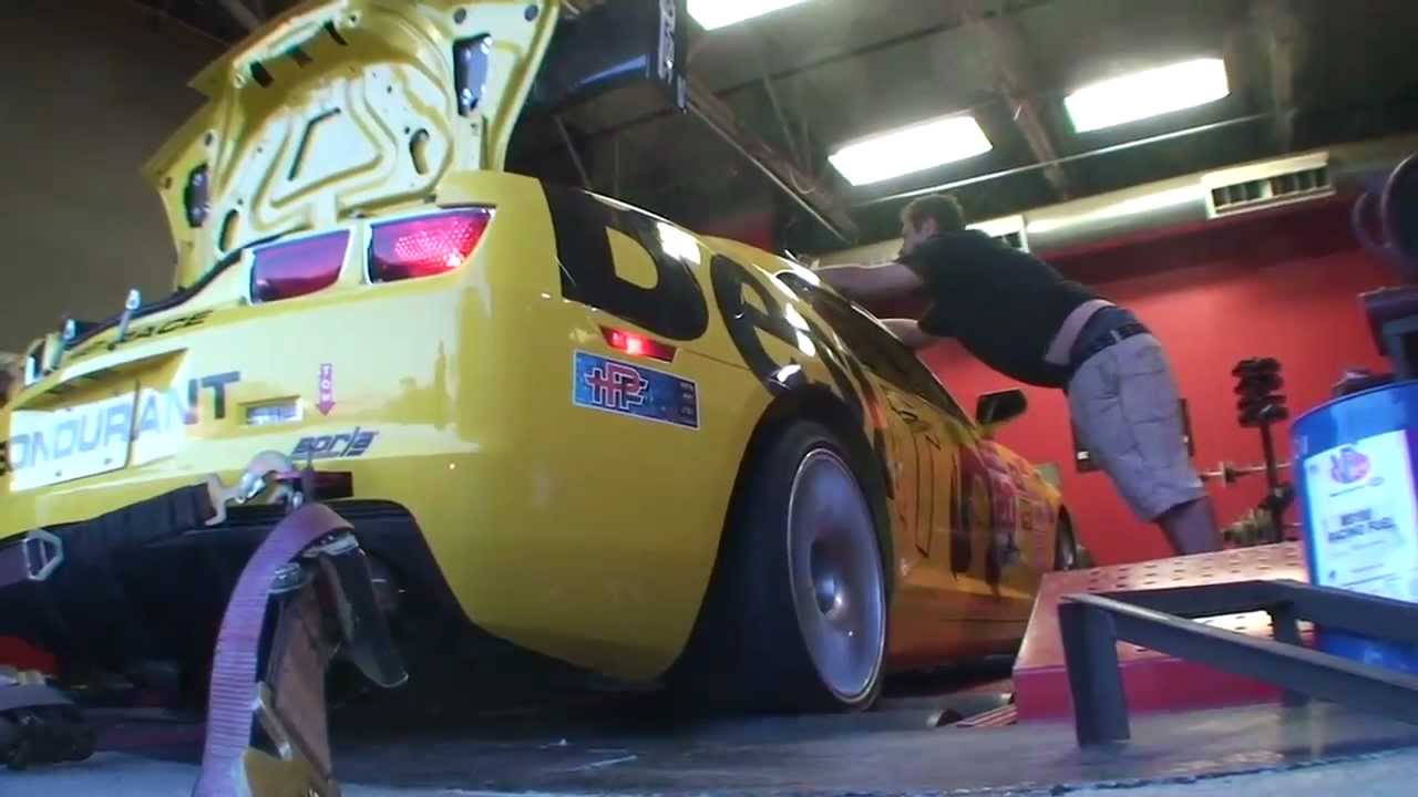 Andy Lee preps for the World Challenge at EVOMS with Zuccone of Evolution MotorSports