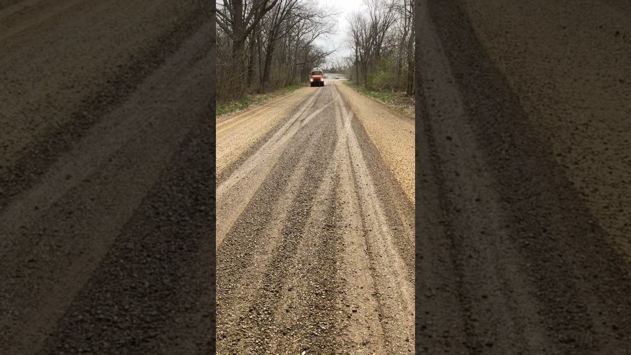 Gravel road dust control