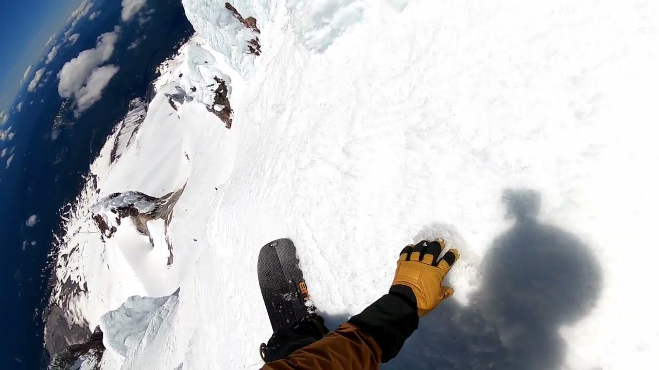 Snowboarding off the Summit of Mt. Hood