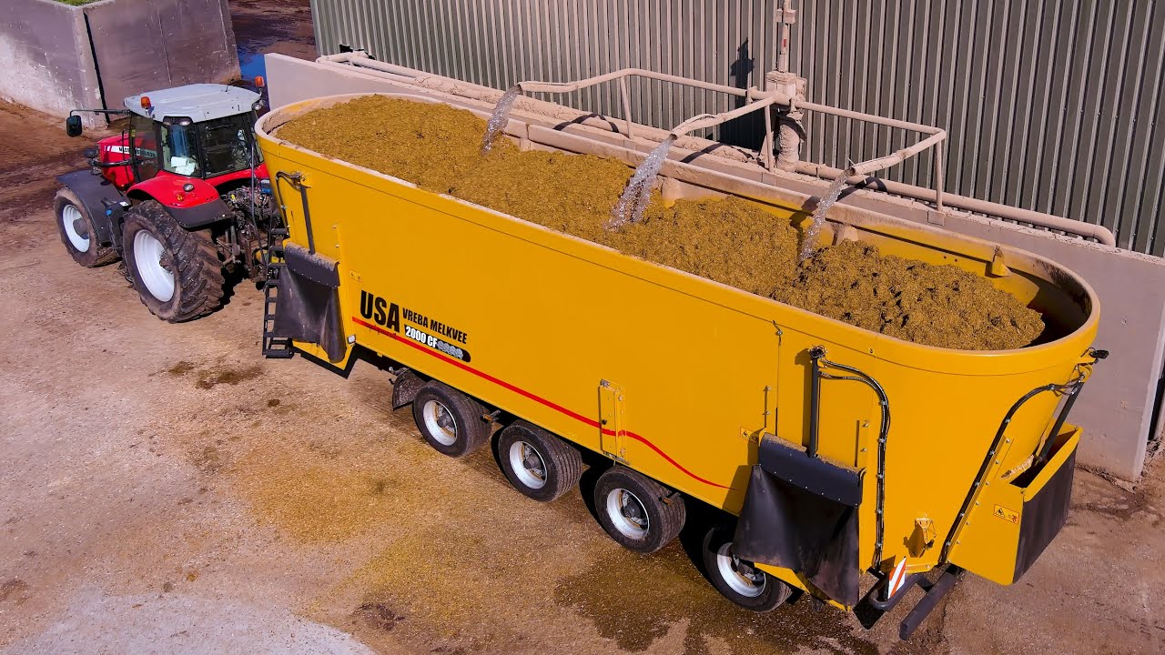 Biggest Feed mixer in Europe | USA Equipment | Vreba Dairy | Loading, mixing and feeding the cows XL