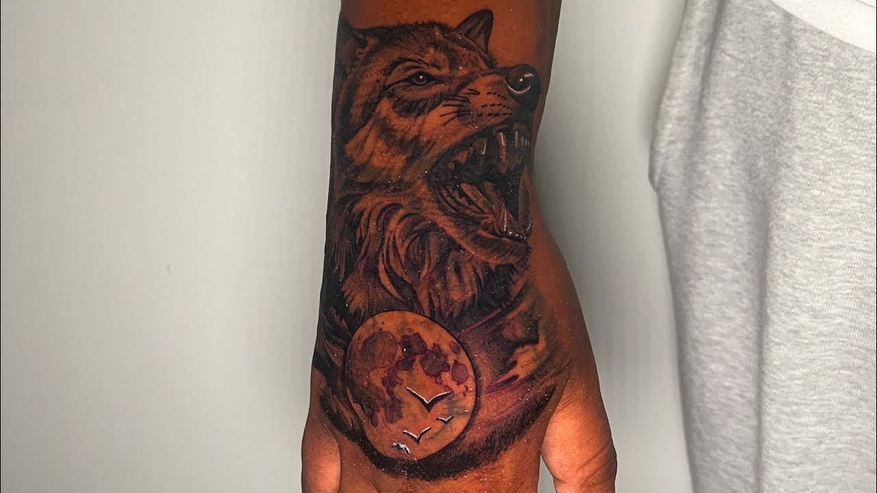 Wolf and moon hand tattoo | Timelapse  ( Tattoo with a Baltimore tattoo artist)