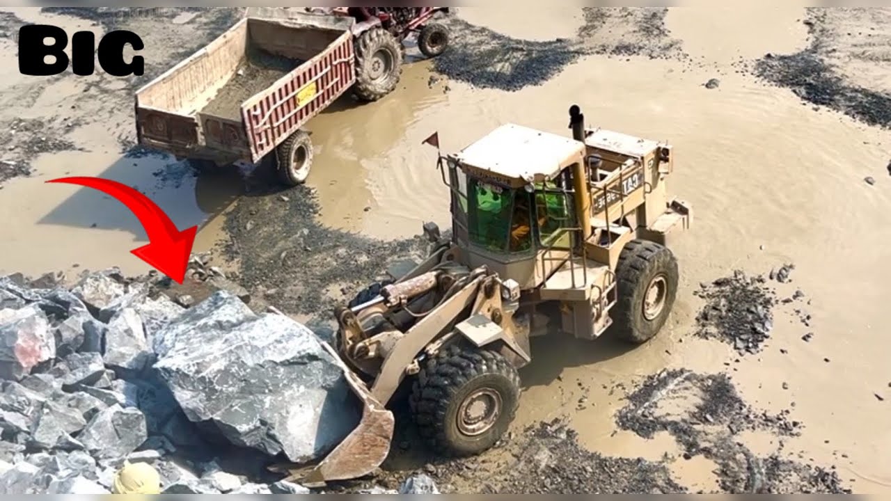 Caterpillar Loader Loading Rocks into Dumper Trucks & Trolleys | Sand Quarry Heavy Equipment Action