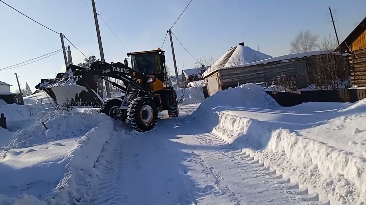 Уборка снега на погрузчике