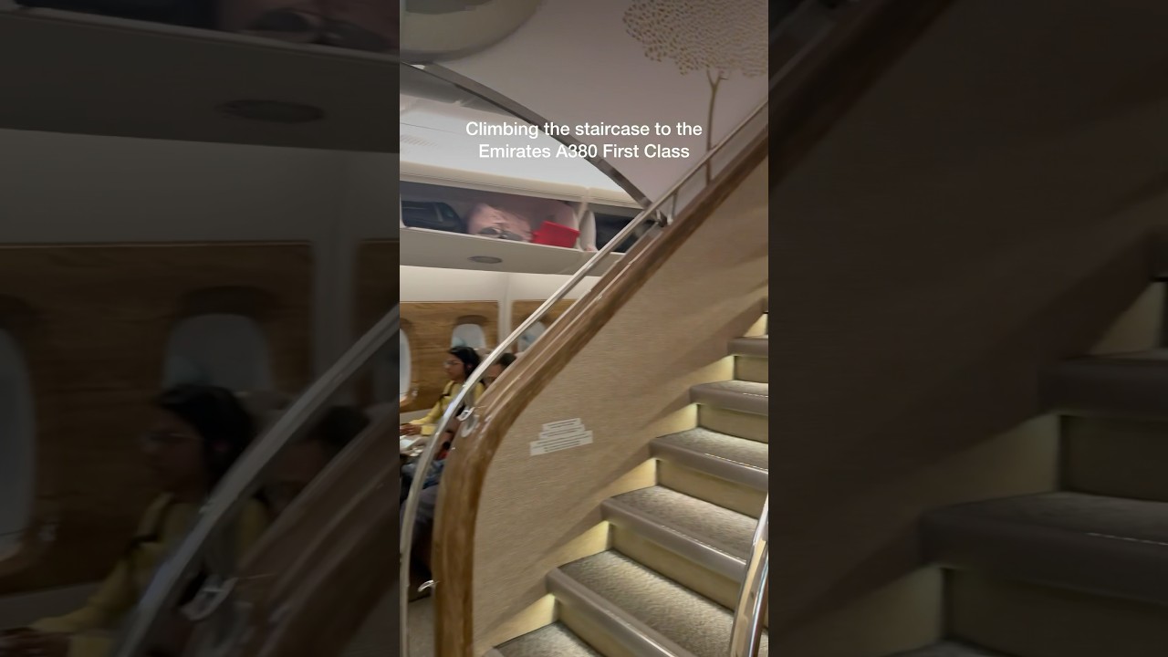 Climbing The Staircase To The Emirates A380 First Class | Lounge Guru