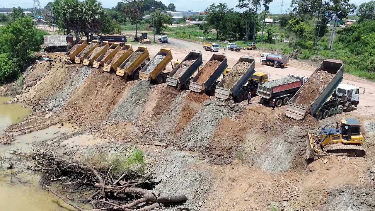 SATISFYING! Land Transforming Heavy Equipment Operator Dozer Pushing Dirt Fill Pond