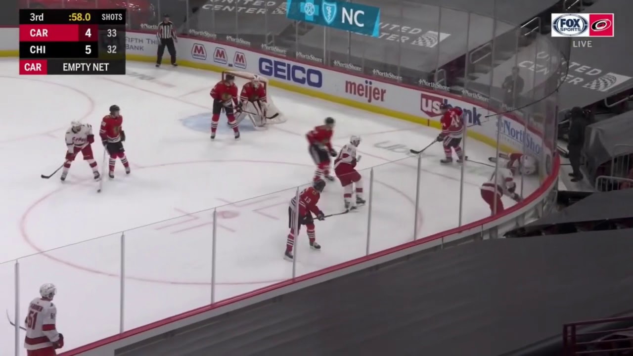 Martin Necas head gets slammed onto the ice after a hit