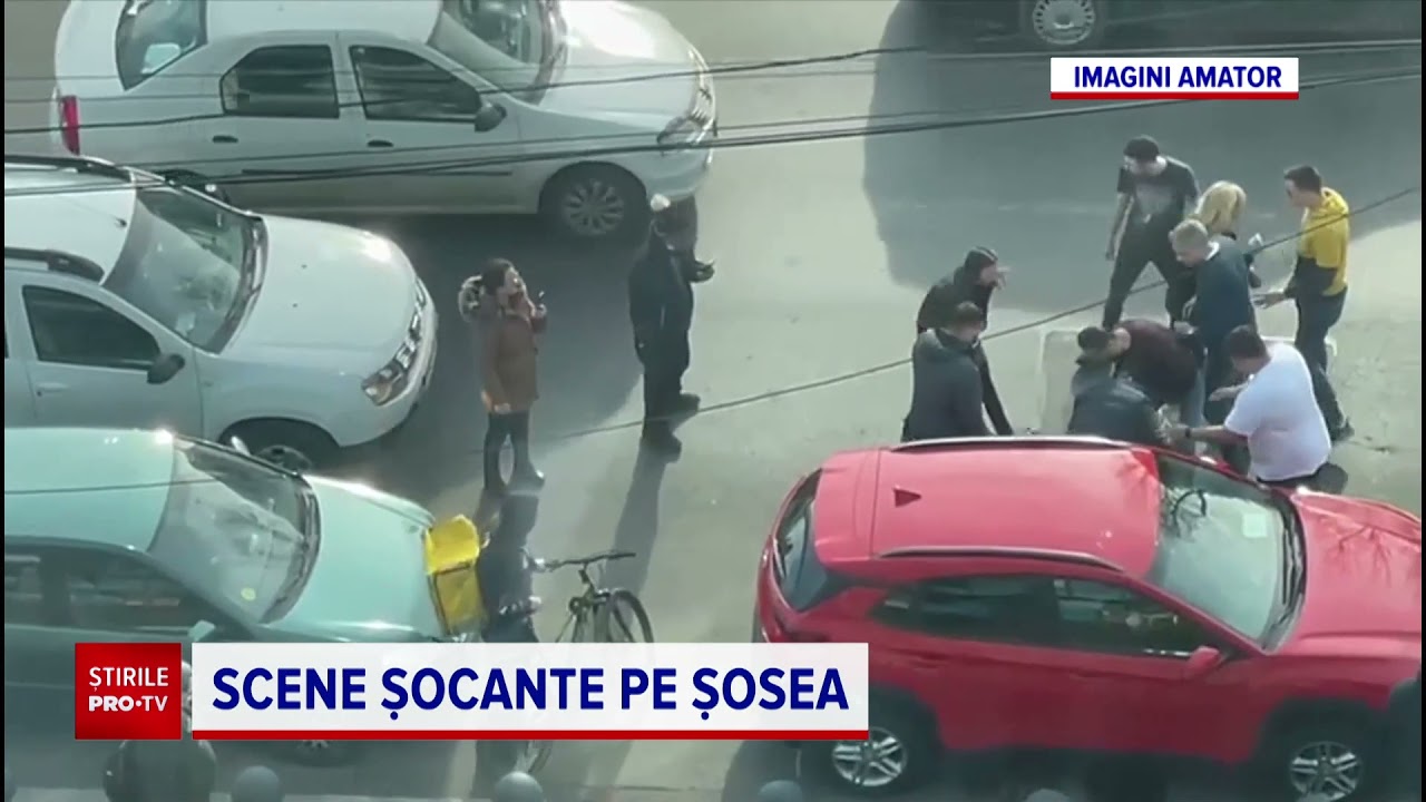 Bătaie în traficul din București. Un curier pe bicicletă a ajuns pe capota unei mașini
