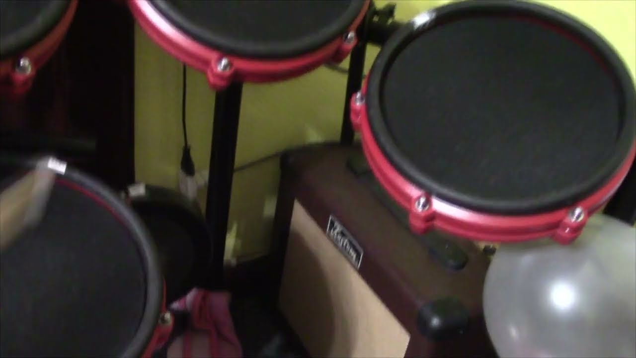 Выбор ударной установки для ребенка Roland HD-1 против Alesis Nitro Mesh Kit