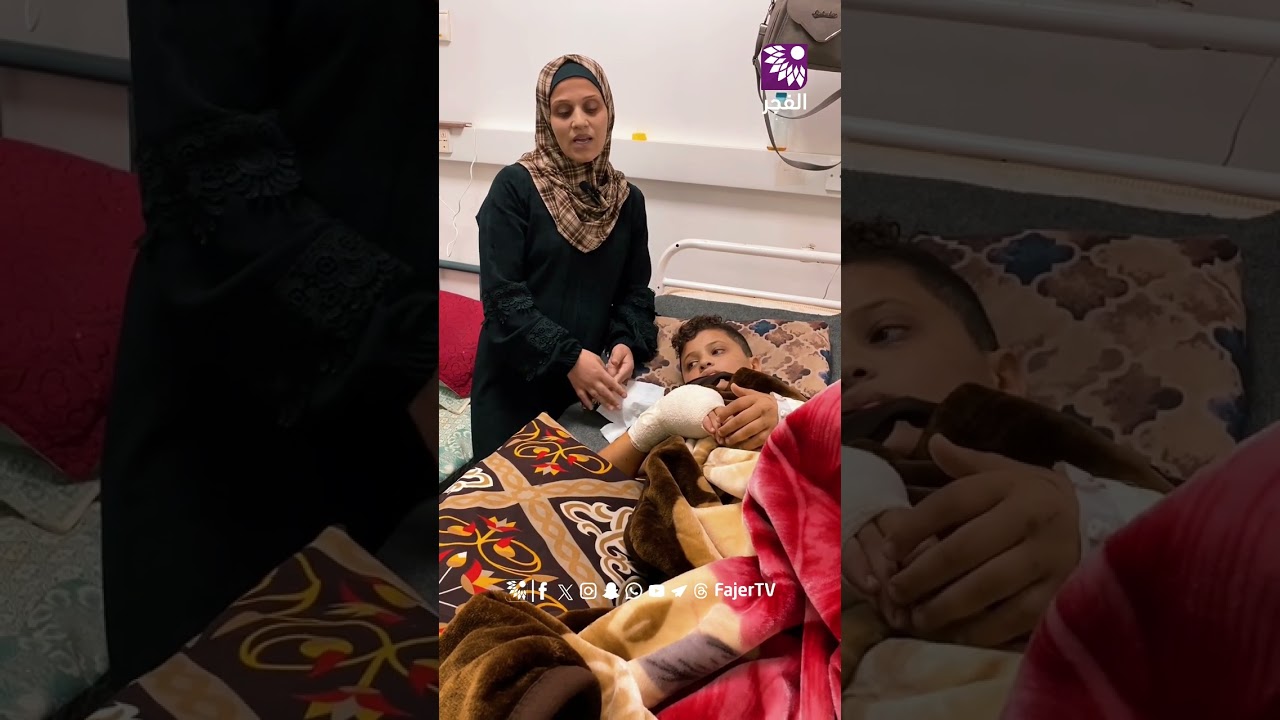 النازحة والدة الطفل الجريح 