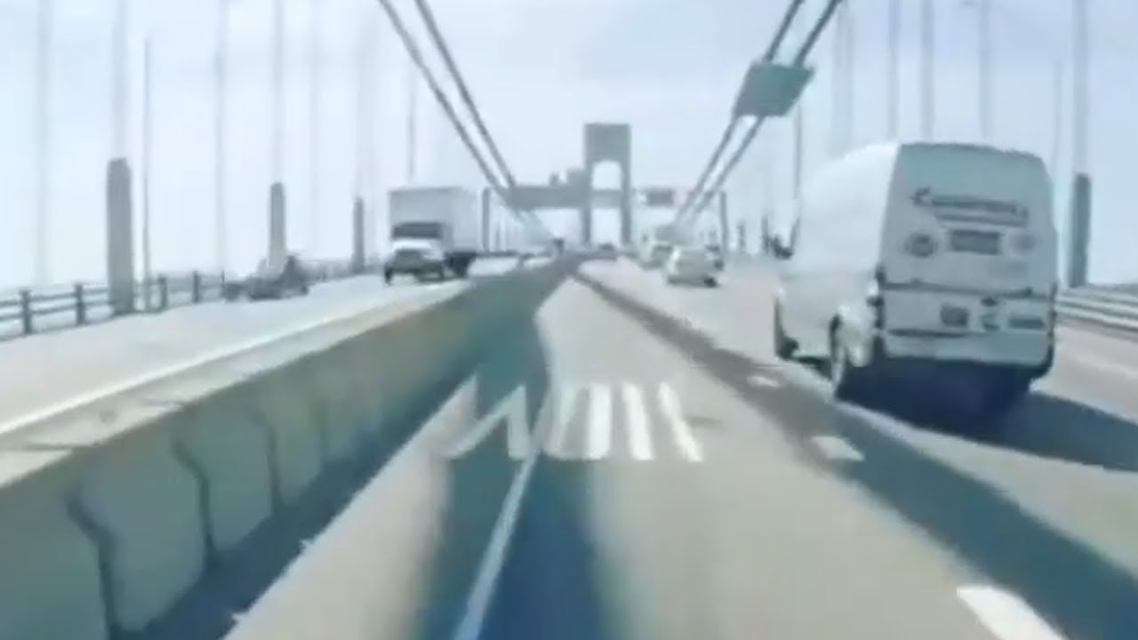 Dangerous motorcycle near-miss on highway