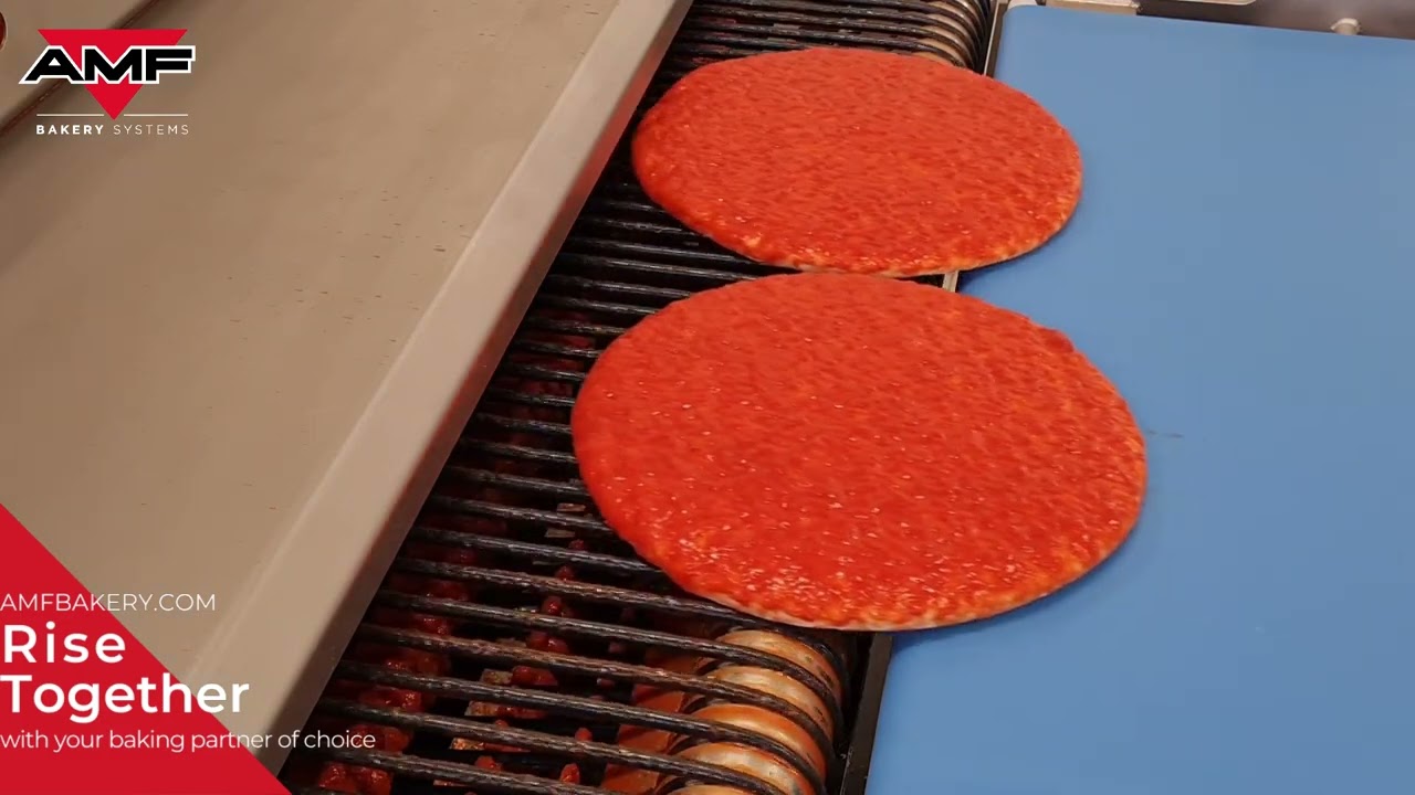 AMF Tromp tomato sauce Enrober - covering pizza base with sauce all over
