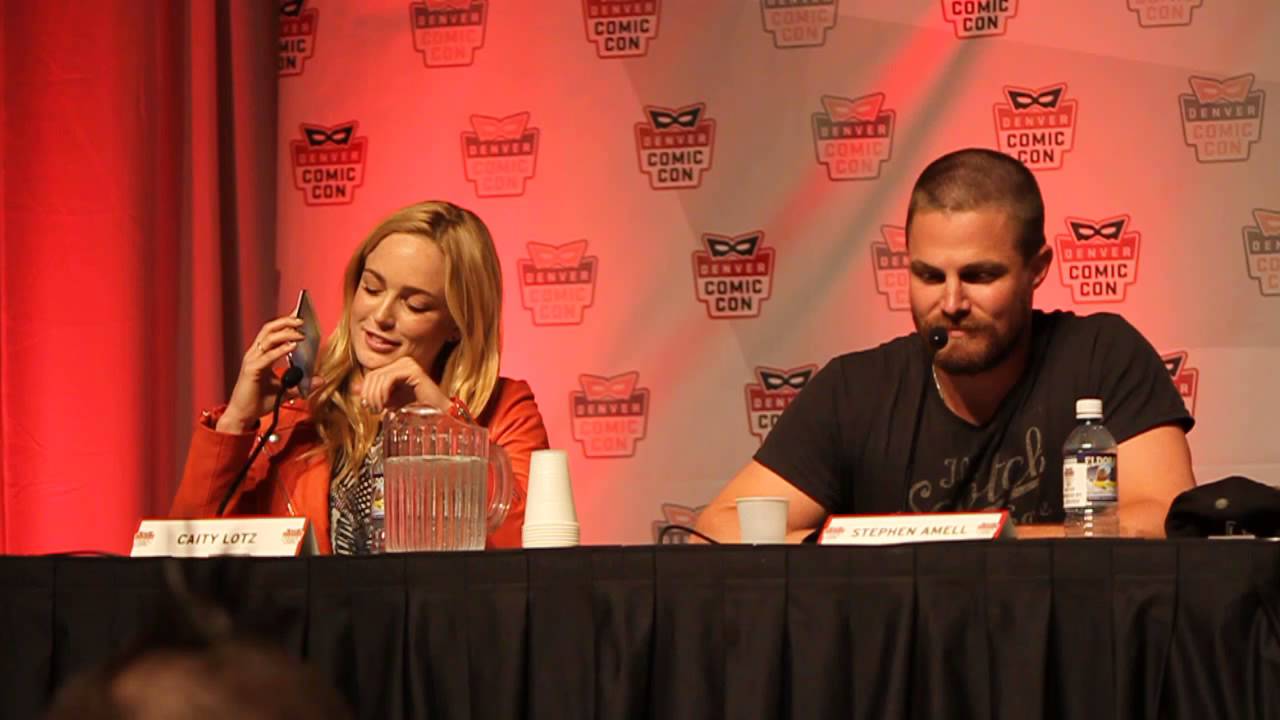 Caity Lotz and Stephen Amell during the Arrow panel at Denver Comic Con 2014