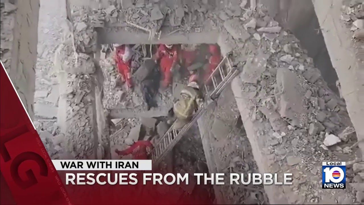 Rescuers in Tehran rush to save people trapped in buildings after US, Israeli attacks