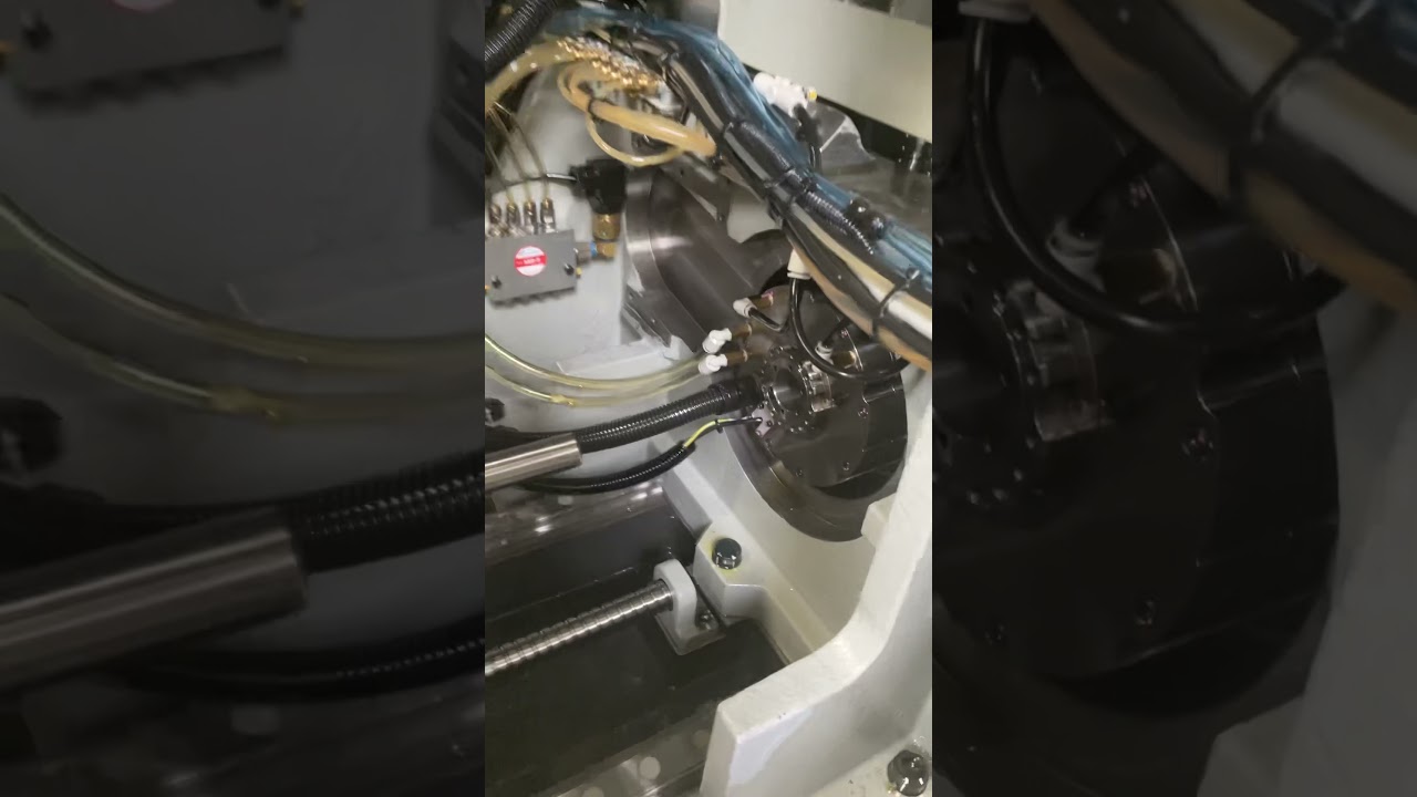 Setting a guide bushing on a Tsugami Swiss lathe.