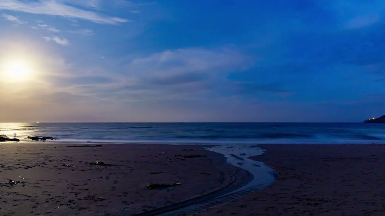 Relaxing beach moonrise and tide 4k