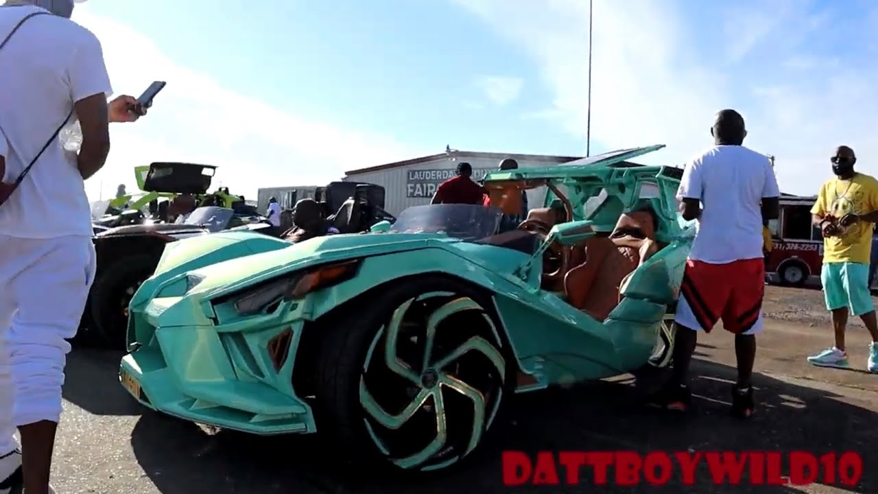 Outrageous Teal painted Polaris Slingshot on 24's