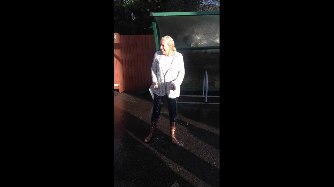 Teacher gets soaked in water for charity