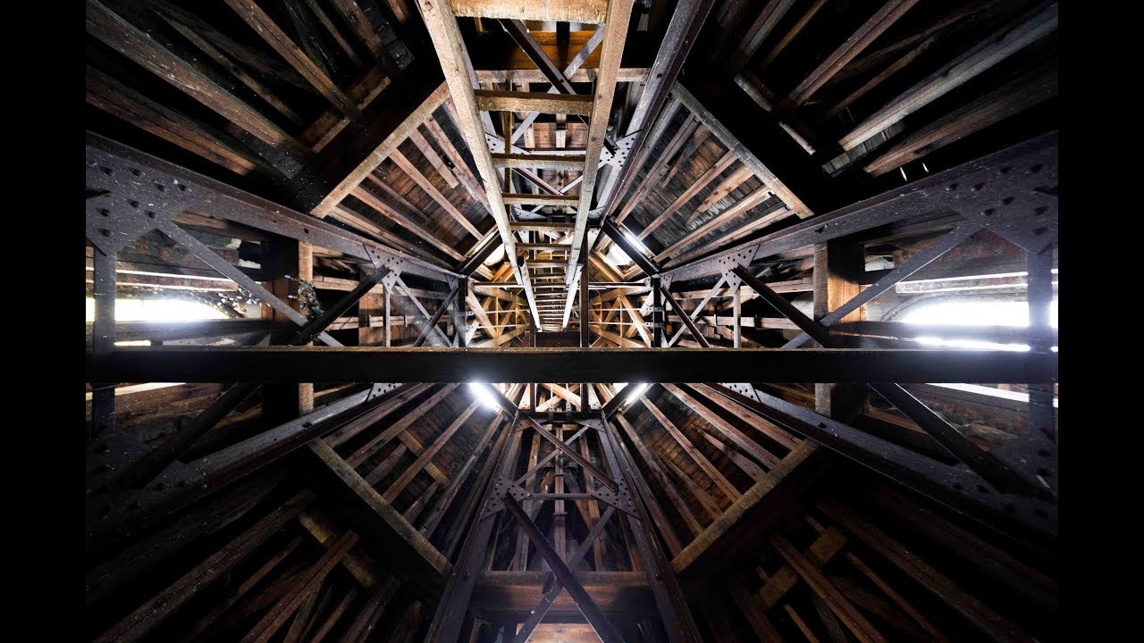 exploring the bell tower of an abandoned cathedral