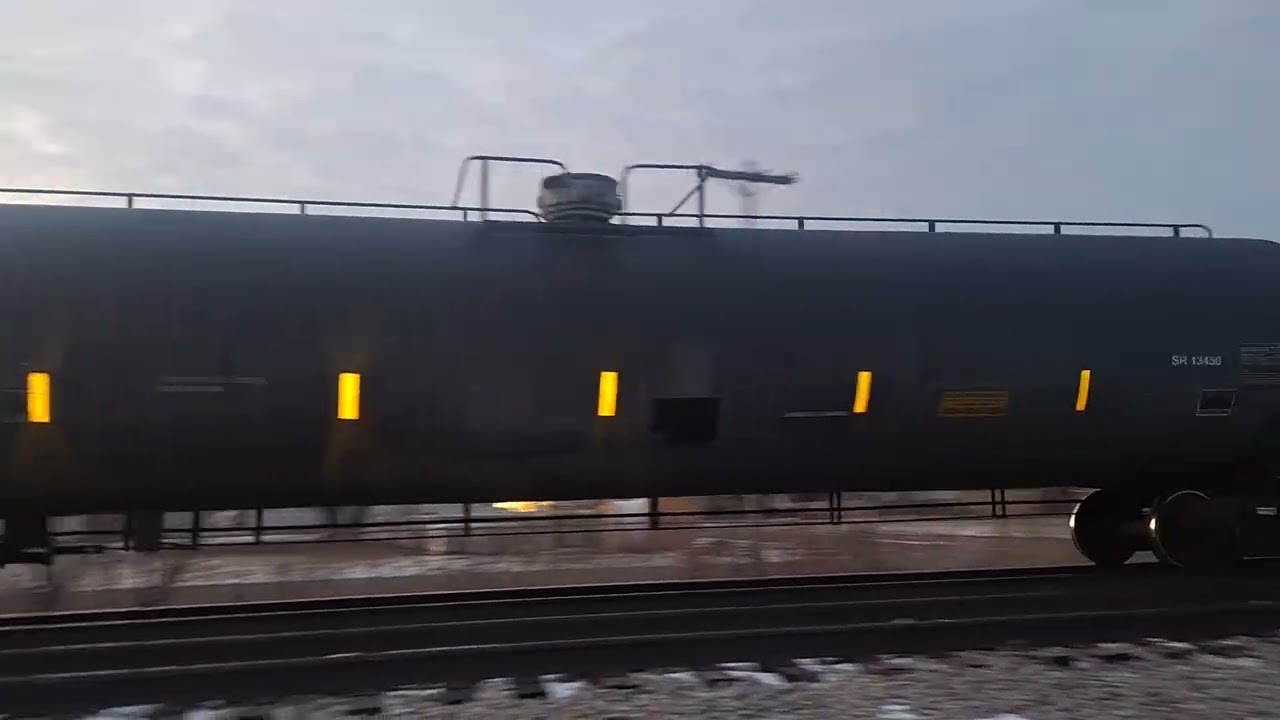 Southbound Manifest Freight Train CN M334 With A CN ET44AC And A CN AC44C6M EX CN C44-9W Rebuild
