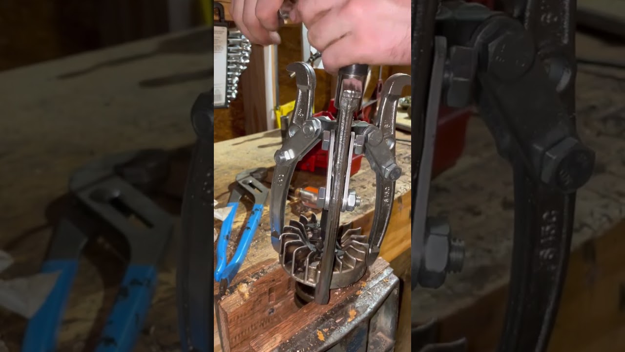 How to remove flywheel with jaw puller #shorts #engines