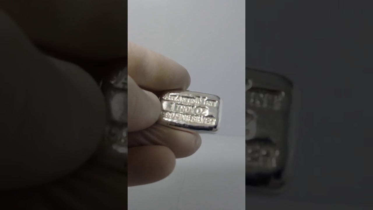 1 oz hand poured 999 fine silver Atlantis Mint bar