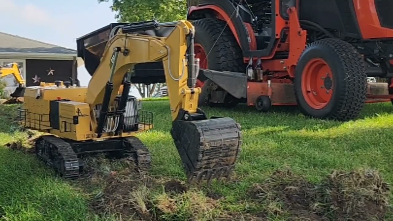 Trenching in electrical line. Two 6015B excavators,  Komatsu 575 dozer   PART 1