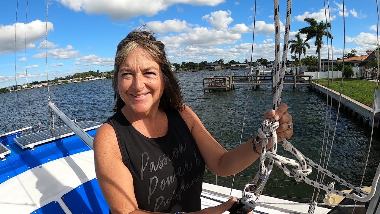 Measuring our mast for a Tides Marine sail track, Gemini 3200.