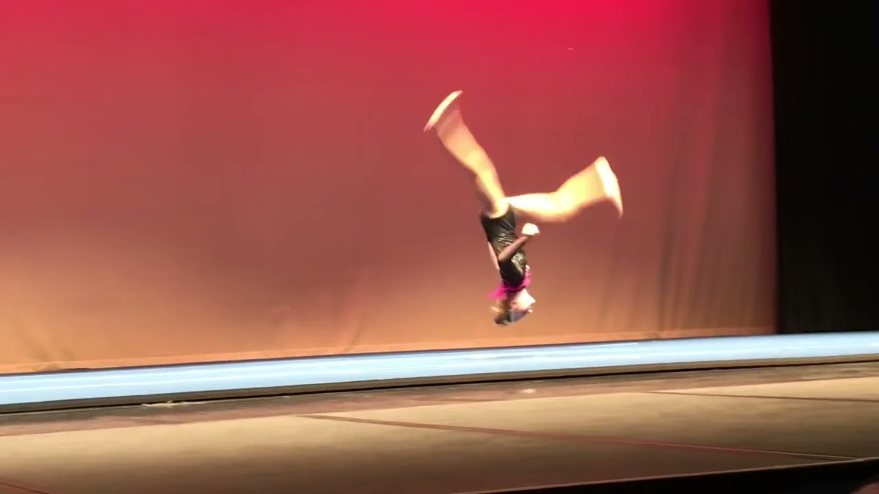 “Run Boy Run” Silas at gymnastics recital, 2022 age 12