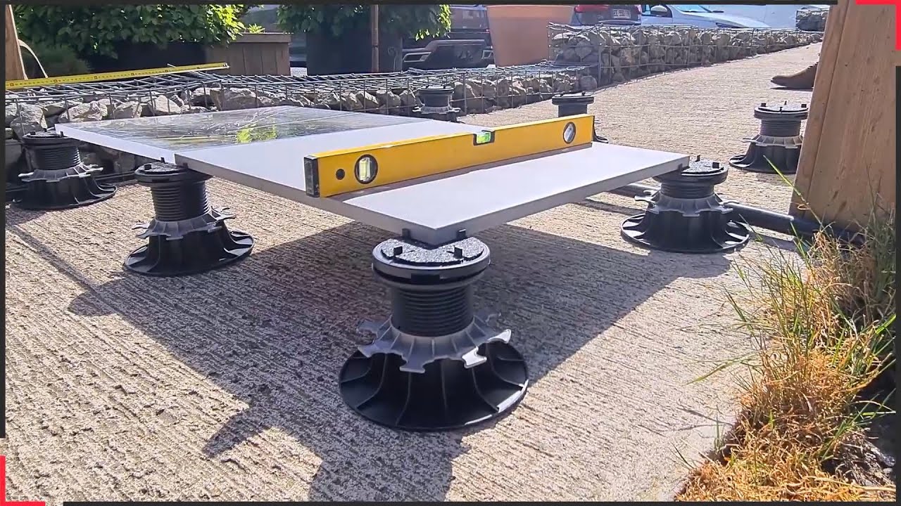 Pose d'une terrasse en carrelage sur plot autonivelant Jouplast