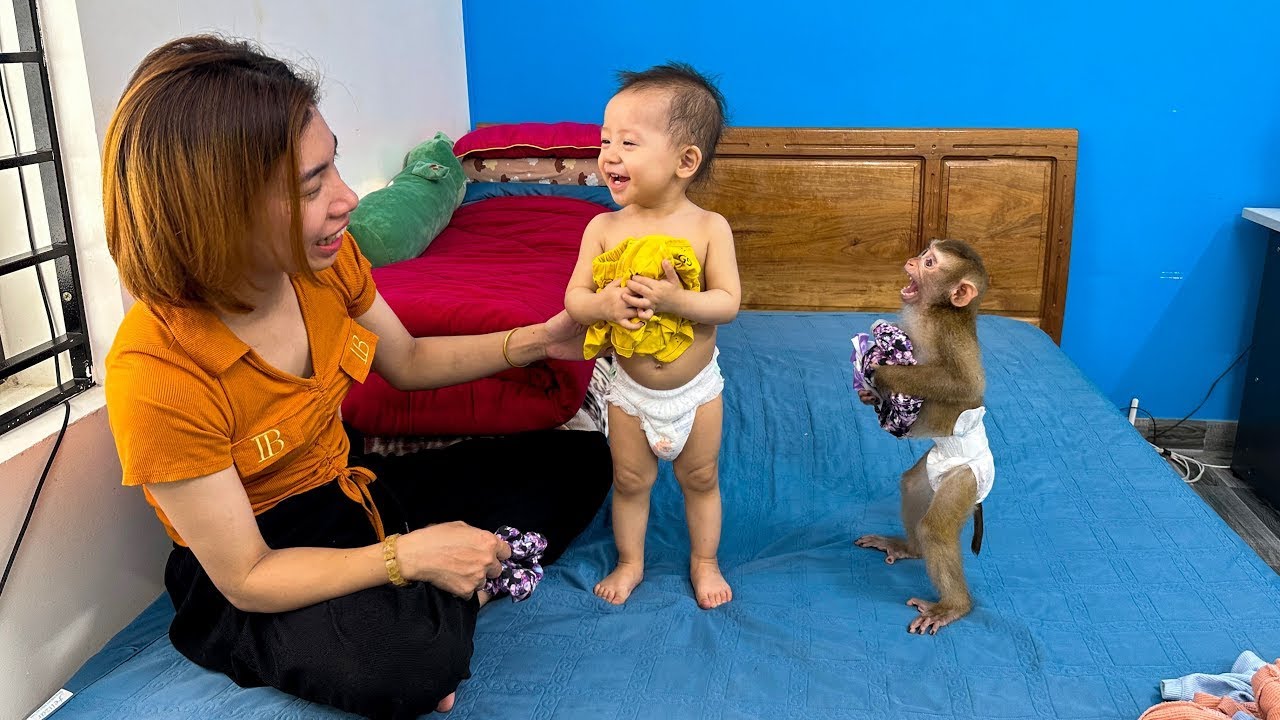 A very happy day for Mom, Diem and Monkey Kaka
