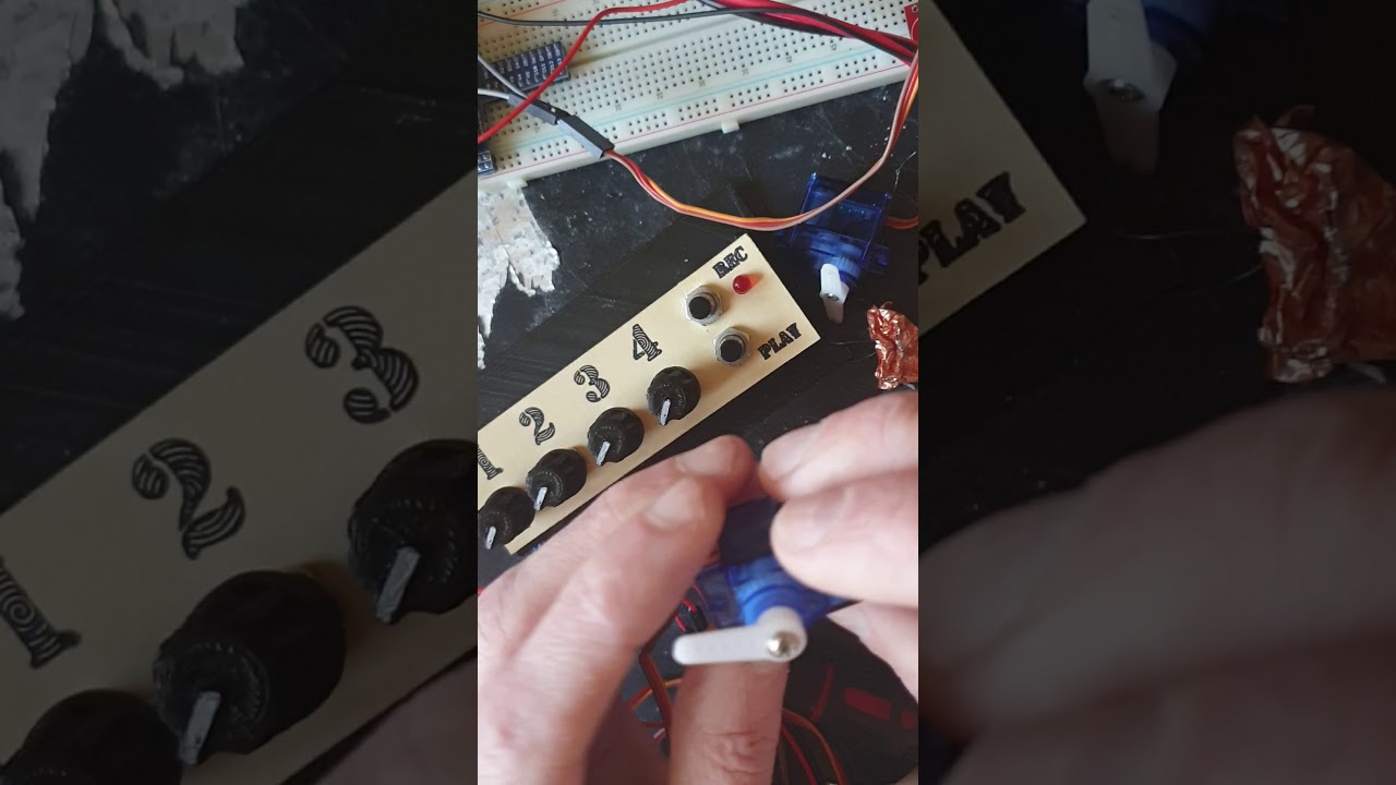 Hack 9g servo to get analog feedback.