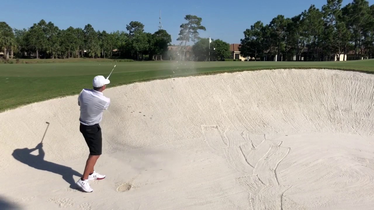 Conseil de golf; Balle enfouie dans la fosse de sable.