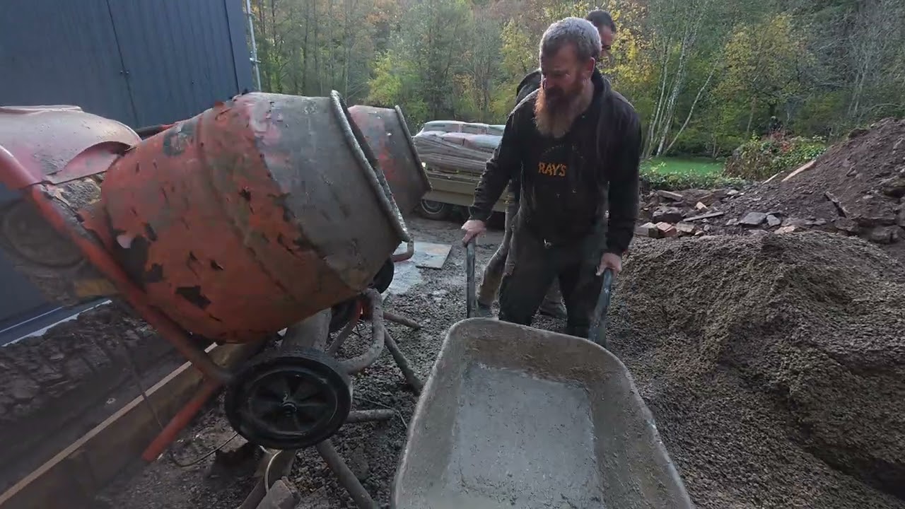 127. Pouring the retaining wall foundation
