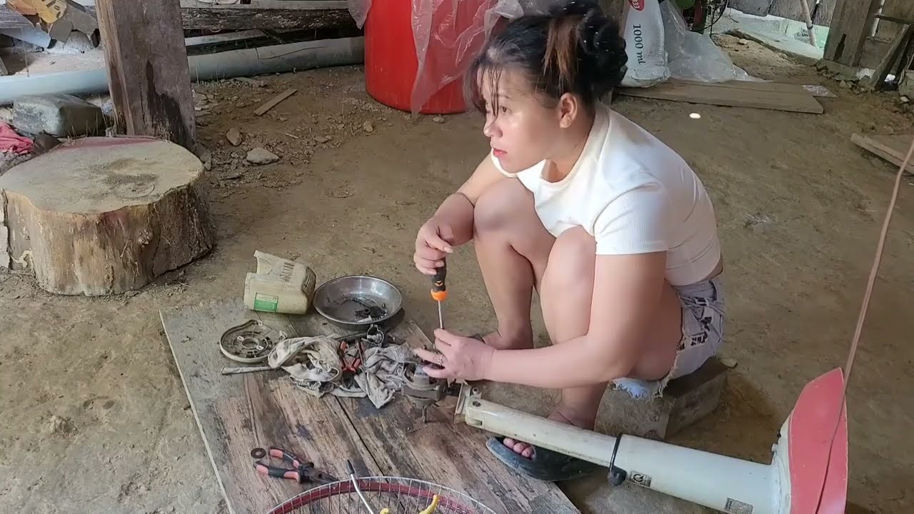 Full video of a female mechanic repairing an electric fan and designing a GX200 engine cover